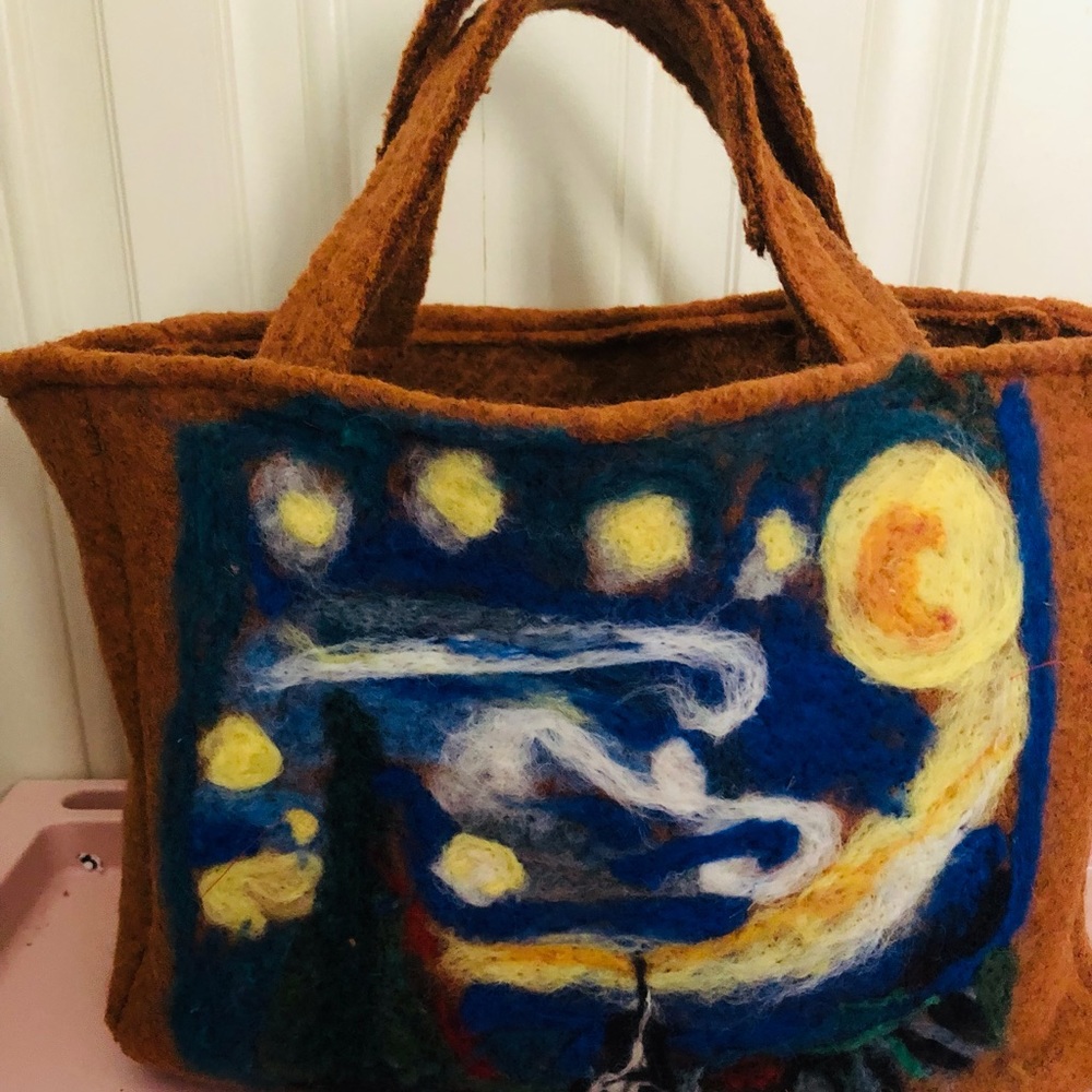 Wool felted handbag / briefcase/ satchel with   Wool art design on one side.